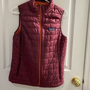 Patagonia Women’s Nano Puff Vest maroon with orange lining, Size Medium
